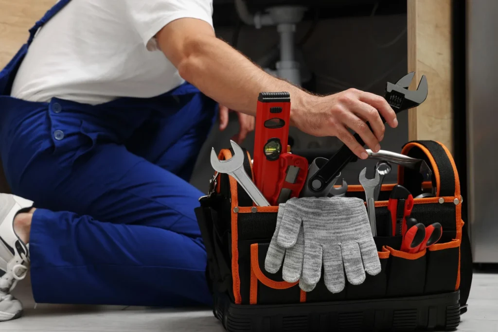 plumber with supplies